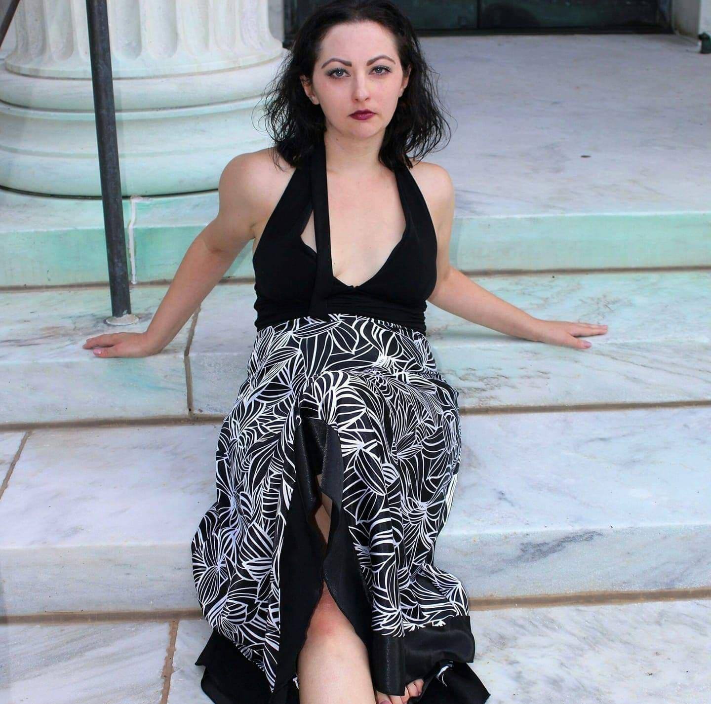 Lindsey LaForest sitting on steps of the Toledo Museum of Art